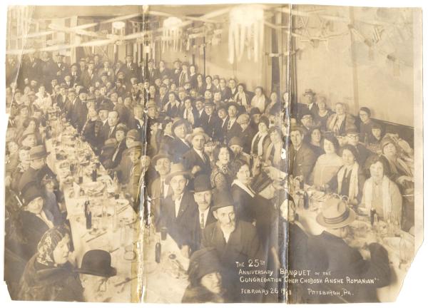 Photograph from “The 25th anniversary banquet of Congregation Oher Chodosh Anshe Romanian,” likely held in the basement of the congregation’s synagogue on Roberts Street in the Hill District. Original image broken into three parts.